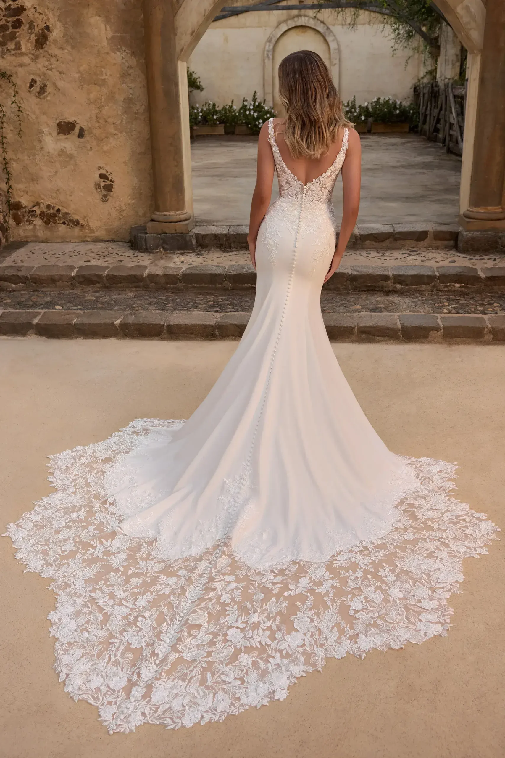 The back of Daisy by Sophia Tolli in Ivory